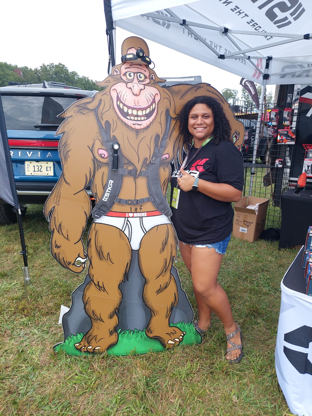 picture from overland expo east featuring STKR account manager Aryanna Cannoy and the sasquach