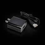 Micro USB cable with wall power adapter on black