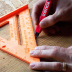 Marking along a speed square with the STKR Mechanical Carpenter Pencil