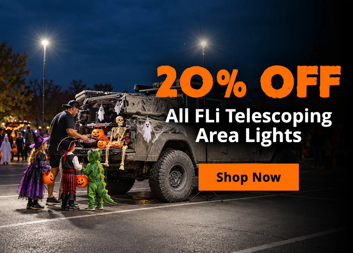 Halloween trunk-or-treat scene lit by telescoping FLi lights